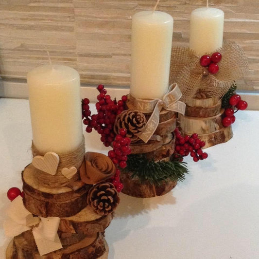 Christmas candle on logs