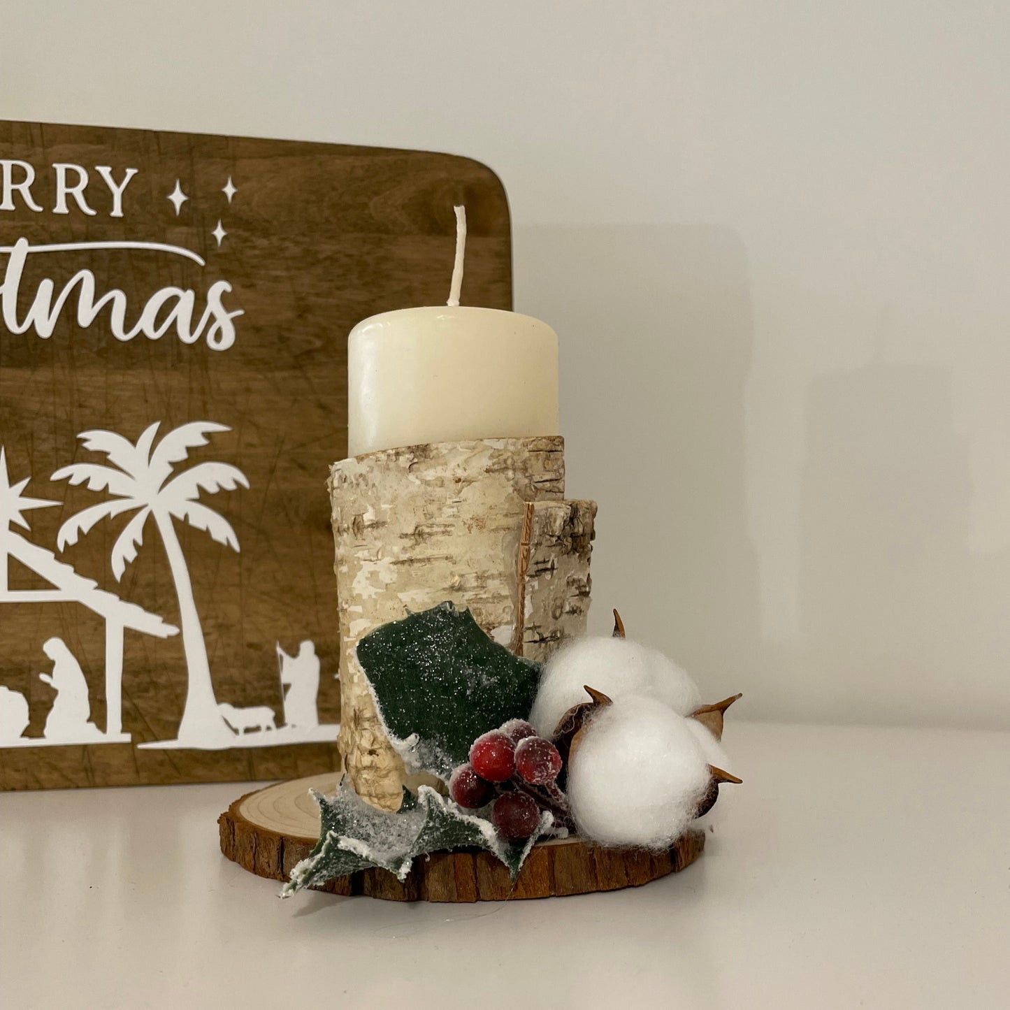 Christmas candle covered in wood