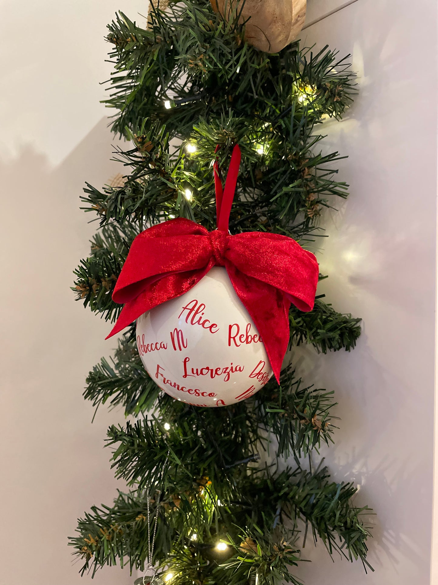 Colored glass Christmas bauble with writing