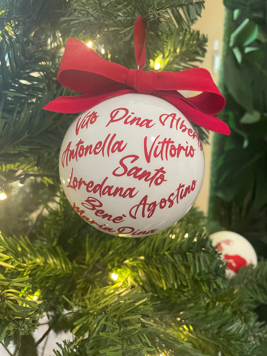 Colored glass Christmas bauble with writing